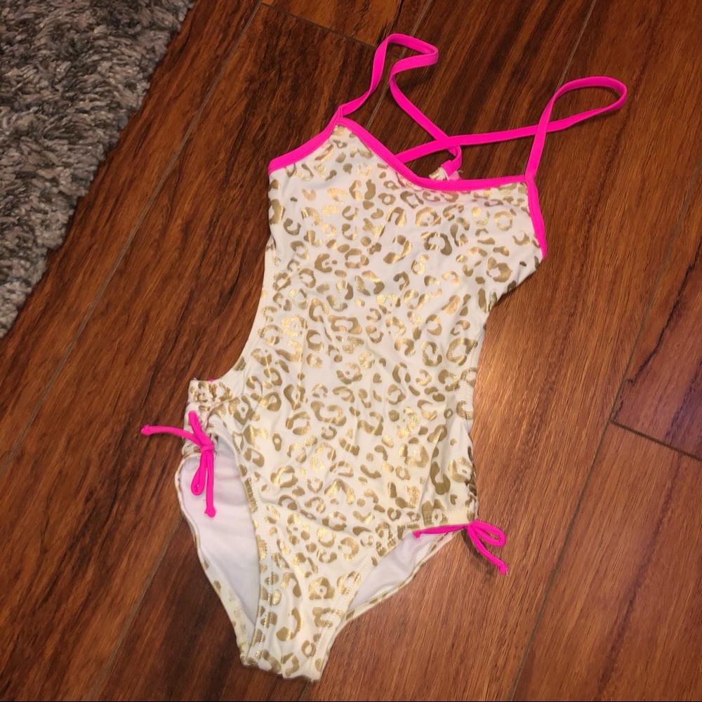 One piece Leopard print swimsuit in girls size 7